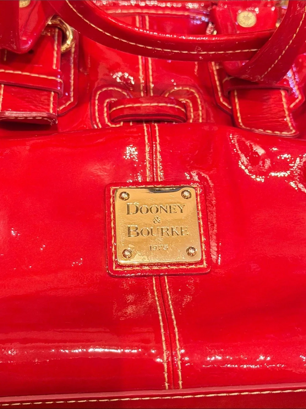 Dooney & Bourke Shiny Red Patent Leather Shoulder Bag with Buckle Straps